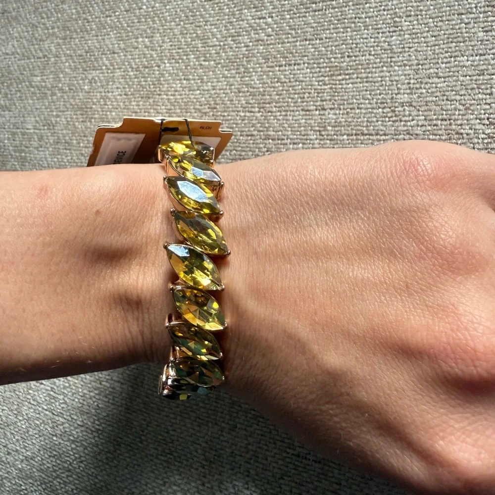 NWT gold-tone stretch bracelet with marquise-cut yellow crystals by Monet.